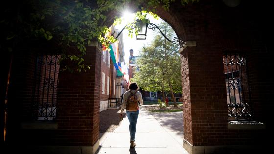 Student walking by Bradley Hall